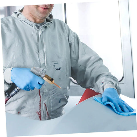 Technician using Auto Dent Repair Welding Hammer Kit With Precision Iron Needle And High Strength Magnets on car panel.