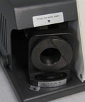 Close-up of Portable Drill Bit Sharpener with 11 Collets for 3 to 13mm Bits, showing angle adjustment and grinding wheel mechanism.