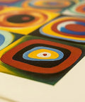 Close-up of colorful abstract circles on a canvas art print, showcasing vibrant concentric designs. Quality canvas texture visible.