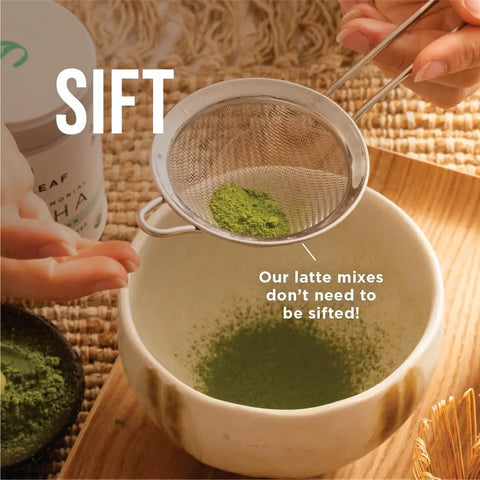 Hand holding a sifter over a bowl filled with green powder, used for Electric Matcha Whisk And Milk Frother With One Button Operation