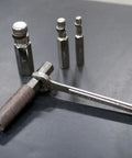 Internal Pipe Removal Tool Nipple Extractor Set Four Piece Inside Pipe Wrench Set on black surface.