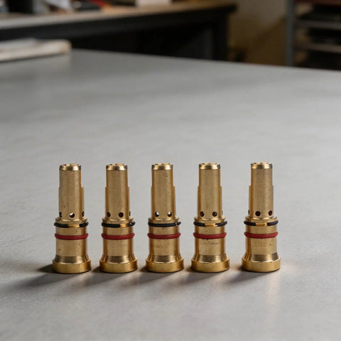 Copper gas diffuser nozzles for MIG welding guns 4335 style, 5 pack, on a workbench