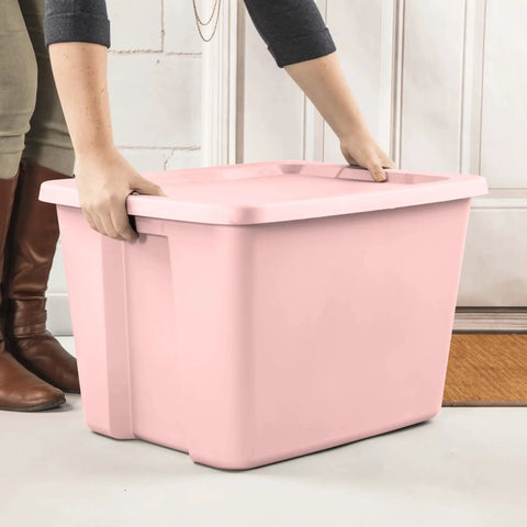 Person lifting a Pink 18 Gallon Storage Bin With Secure Snap On Lid Heavy Duty Stackable Plastic Tote Clutch.