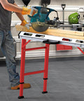 Portable Welding Table 42 By 21 Inches Folding Height Adjustable Top With Beefy 1000 Lbs Capacity in a garage setting