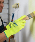 Heavy Duty Micro Foam Nitrile Work Gloves With Hella Breathable 15 Gauge Nylon Shell And Killer Tiger Stripe Grip For Auto Repair And Precision Mechanical Assembly Tasks Pack Of Three X Large in use while painting a wall.
