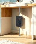 Bulletproof 3000W Tankless Water Heater With LCD Screen installed under a sink, showcasing sleek black design and connected plumbing.