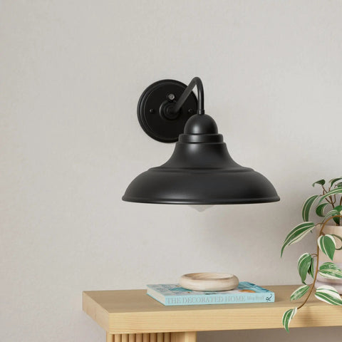 Gooseneck Dusk To Dawn Outdoor Wall Sconces Matte Black Farmhouse Barn Light Two Pack 12 Inch Exterior Wall Light Fixtures For Porch Entryway And Garage, side view on table with plant and books.