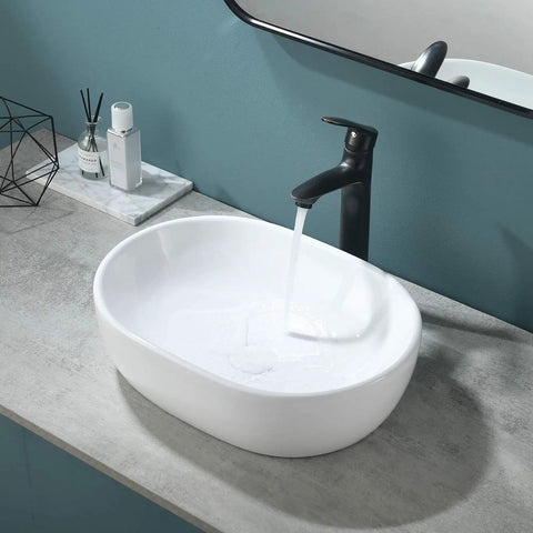 Oval Vessel Sink 19x14 Inches Ceramic Above Counter White Porcelain Modern Art Basin For Lavatory Vanity Cabinet Sleek Dope Look Durable White Glaze Easy Clean Contemporary Bathroom Fixture