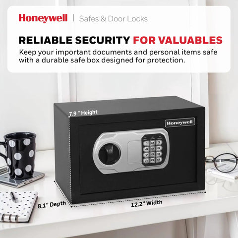 Compact Home Safe With Digital And Key Lock, DOJ-Approved Personal Security Box, 0.28 Cu Ft Black, on a desk with dimensions shown