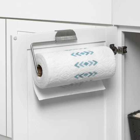 Over The Cabinet Paper Towel Holder in Brushed Nickel installed on white cabinet door with paper towel roll