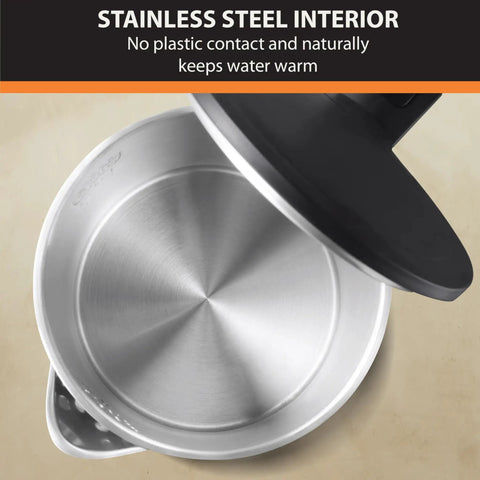 Interior view of 1.5L Cordless Electric Kettle With Cool Touch Exterior And Stainless Steel Interior Boils One Cup In 80 Seconds.