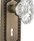 Egg And Dart Plate With Keyhole And Chateau Knob Passage Set For One Door 2 3 8 Inch Backset Antique Brass Solid Forged Brass Hardware With Lead Crystal Knobs Restoration Ready No Lock Ideal For Halls And Closets visible with ornate detailing and lead crystal knob.
