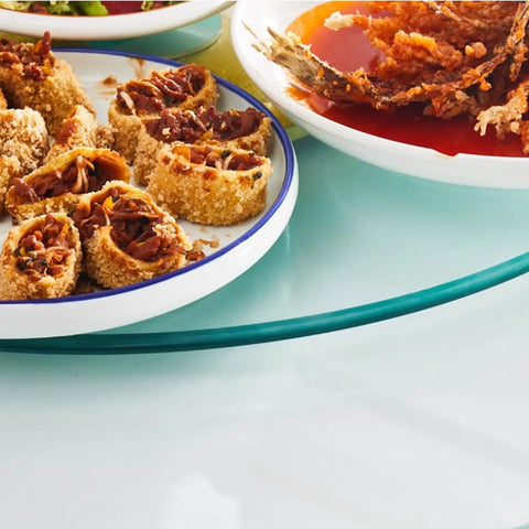 Large Round Lazy Susan Turntable With Swivel Assist System, 100 Cm Diameter Glass Serving Tray with food plates on top