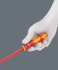 Kraftform Kompakt VDE 17 Universal 1 Set For Pros And DIYers with anti roll design handle being held, red VDE blade visible.