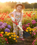 Child gardening among flowers using Short Wooden Shovel Handle Replacement 36cm For Garden Shovels, D-shaped grip visible