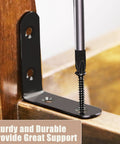 Close-up of black L-shaped corner bracket with screw securing wood, part of 18 Pack L Shape Corner Brackets Stainless Steel Heavy Duty