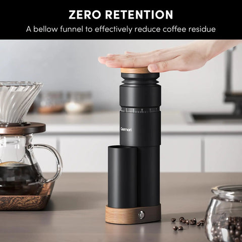 Wirsh Geimori T38 Plus Portable Electric Burr Coffee Grinder with bellow funnel for zero retention on cafe counter.