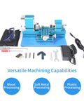 Front view of a blue mini metal lathe with tailstock and tool post, plus safety glasses and assorted tools.