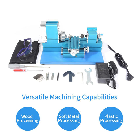 Front view of a blue mini metal lathe with tailstock and tool post, plus safety glasses and assorted tools.