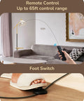 Lit Arched Floor Lamp Black Metal Standing Arc Lamp with remote control and foot switch by a couch