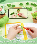 Hands crocheting using the Plant Crochet Kit for Beginners with 6 Succulent Projects, guide open, green yarn, video tutorial.