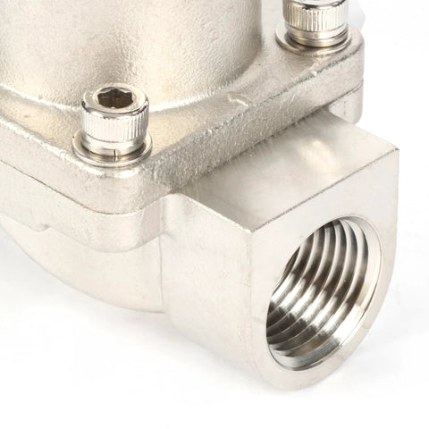 Stainless steel 1/2-inch solenoid valve body with threaded inlet port (close-up)
