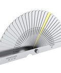 Front view of a 6-inch stainless steel vernier caliper with a 32-blade feeler gauge fanned out