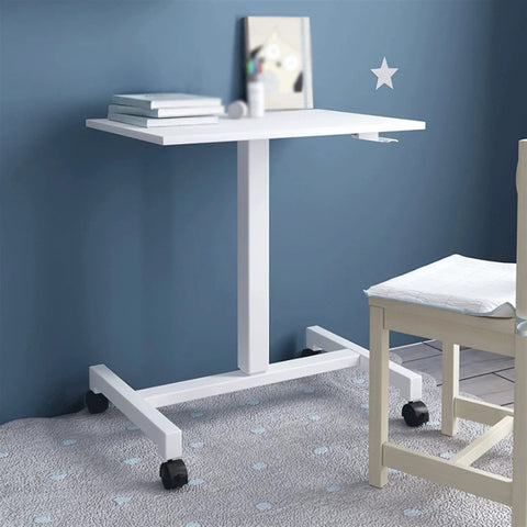 Adjustable Mobile Laptop Stand With Smooth Rolling Casters portable standing desk with white top and steel frame in modern room.