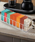 Clear Acrylic 8 Slot Tea Bag Organizer For Drawer Pantry And Countertop Tea Bag Holder With tea bags on kitchen counter.