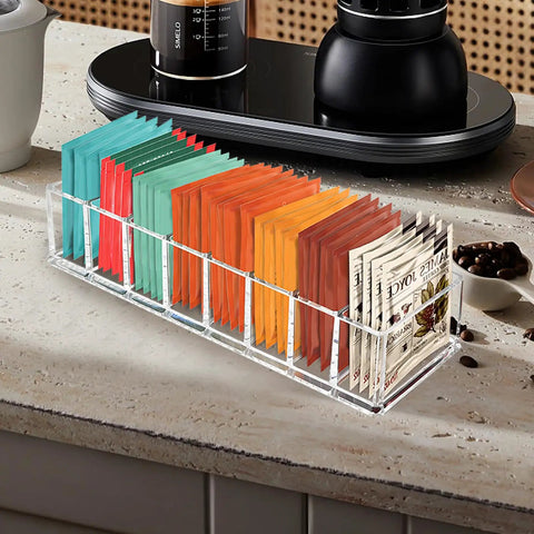 Clear Acrylic 8 Slot Tea Bag Organizer For Drawer Pantry And Countertop Tea Bag Holder With tea bags on kitchen counter.