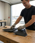 Man assembling Hydrofoil Stabilizer Fin Set for Outboard Motors Molded Aerodynamic Hydrofoil Wings for Amped Up Performance