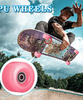 Skateboarder using 8 Pack Roller Skate Wheels With Bearings Installed And Toe Stoppers For Double Row Quad Skates And Skateboard Indoors Or Outdoors 32mm By 58mm 82A Pink Ready To Roll.