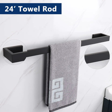 Dope 4-Piece Brushed Nickel Bathroom Hardware Set With 24-Inch Towel Bar on wall, holding gray towel, modern square base design
