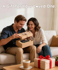 Couple opening a gift box with Cordless Tire Inflator Portable Air Compressor With Dual Power And 5400 mAh Battery on a couch