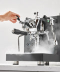 Person using Alto Espresso Machine With Flow Control, Dual Boiler And PID For Precise Temperature, Pro Steam Paddles In Black