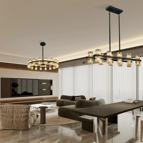 Modern living room with Wagon Wheel 9 Light Farmhouse Chandelier in Matte Black, 32 Inch Industrial Pendant Light Fixture above seating area.
