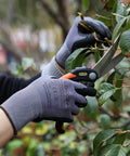 LOCCEF safety work gloves, gray knit with black nitrile-coated palm, front view of hands pruning a branch