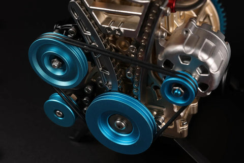 Premium Metal Inline Four Cylinder Engine Model Kit That Runs Sick And Tight Motorized Assembly Featuring Anodized Aluminum Craftsmanship close-up of blue pulleys and belt system.