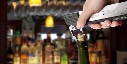 Using corkscrew on Six In One Folding Grill Utensils Set Featuring Fork Spatula Knife Tongs Bottle Opener And Corkscrew For Fourteen Inch Portable