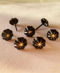 Premium 7/16 Inch Upholstery Tacks For Furniture Fix Ups, decorative black nailheads with textured design and steel points.