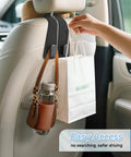 Top Shelf Universal Car Seat Headrest Hooks 2 Pack Suede Leather Bag Holders For Purses Coffee Mugs And Grocery Totes, showing bag and water bottle.