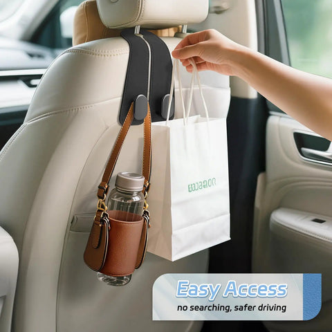 Top Shelf Universal Car Seat Headrest Hooks 2 Pack Suede Leather Bag Holders For Purses Coffee Mugs And Grocery Totes, showing bag and water bottle.