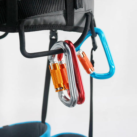 Close-up of carabiners on a Half Body Climbing Harness For Mountaineering And Ice Climbing, Heavy Duty Safety Belt For Men And Women