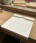 Close-up of Heavy Duty Desktop Wood Carving Jig With Killer Grip And Precision Stop, made of birch plywood for precise shaping.