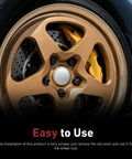Slick Silver Wheel Center Caps Snap In Hub Covers For Cars And Suv sprucing up a gold wheel with smooth metallic trim.