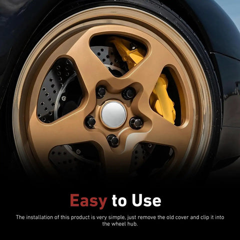 Slick Silver Wheel Center Caps Snap In Hub Covers For Cars And Suv sprucing up a gold wheel with smooth metallic trim.