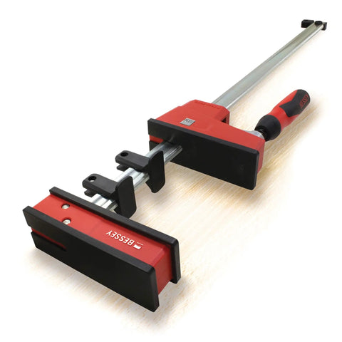 Heavy Duty 40 Inch Parallel Clamp Delivering 1700 Lbs Of Tight Grip For Woodworking Cabinetry And Weekend Project Grind with red handle.