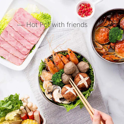 Foldable Electric Travel Hot Pot For Camping And Office with vegetables and seafood, ready for cooking, portable and compact.