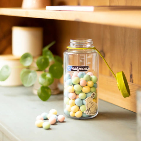 32 Oz Wide Mouth Hydration Bottle For Everyday Use, Leak Proof And BPA Free, filled with colorful candies, open cap on side