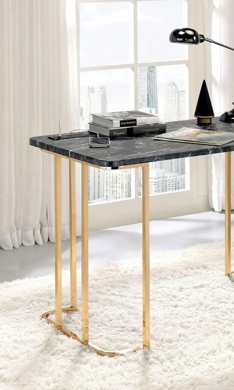Adjustable Standing Computer Desk With Built Storage And Power Port, Sleek Faux Marble Work Table For Home Office, gold metal frame with books and lamp.